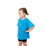 Young girl wearing a blue t-shirt with a logo on a white background